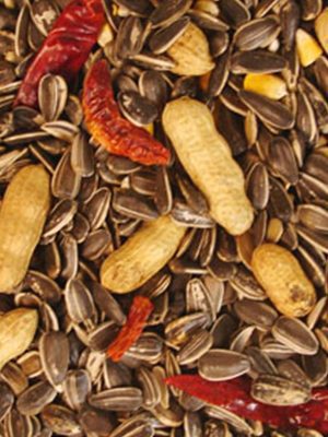 A close up of Parrot Mix 1 lb. sunflower seeds and peppers.
