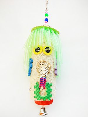 A Nosey toy with a green wig hanging from it.